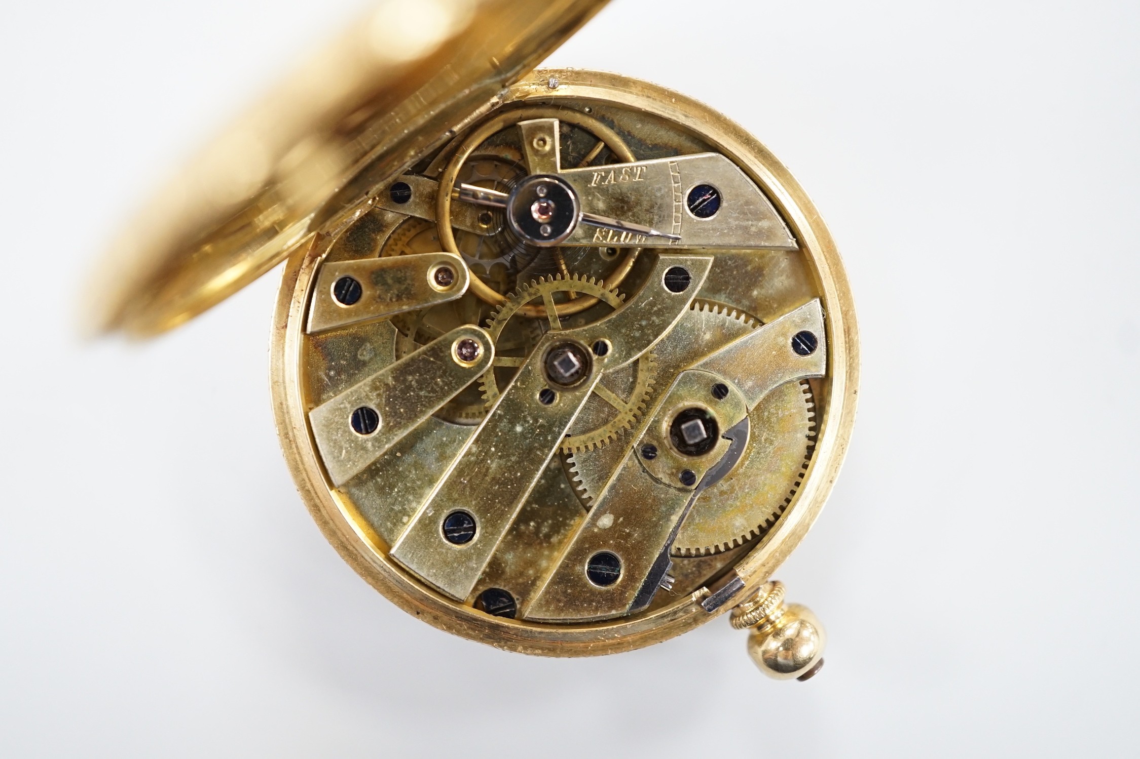 A continental 18k yellow metal open faced fob watch, with Roman dial and key, 40mm, gross weight 41.8 grams.